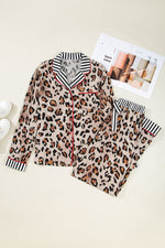 Load image into Gallery viewer, Leopard print pajama set with striped shirt and pants on a light background
