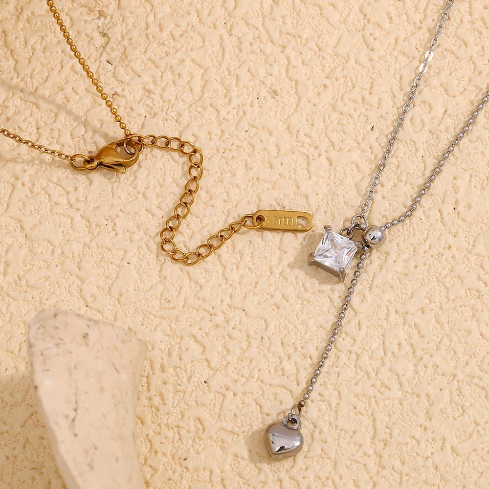 CZ Heart Tassel Necklace – Stainless Steel PVD Plated | Silver & Gold - The PM Edit