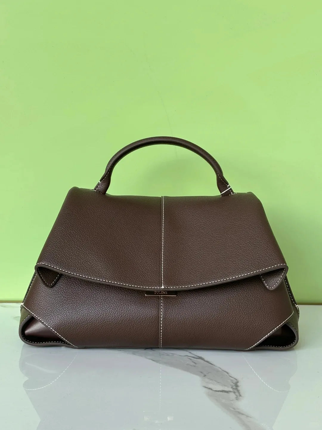 Structured Leather Handbag – Sleek. Chic. Made to Move.