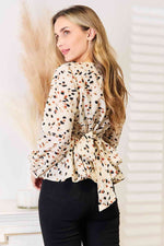 Load image into Gallery viewer, Printed Tied Plunge Peplum Blouse
