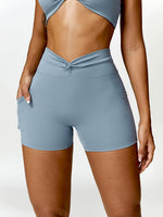 Load image into Gallery viewer, Twisted High Waist Active Shorts with Pockets
