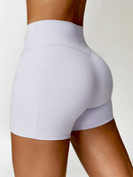 Load image into Gallery viewer, Twisted High Waist Active Shorts with Pockets
