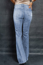 Load image into Gallery viewer, Distressed Raw Hem Flare Jeans Pants
