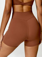 Load image into Gallery viewer, Twisted High Waist Active Shorts with Pockets
