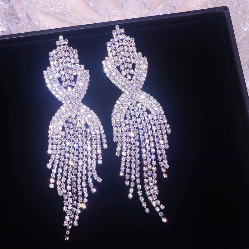 Crystal Infinity Twist Tassel Drop Earrings | Rhinestone Fringe Statement Earrings