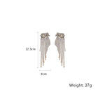 Load image into Gallery viewer, Long Tassel Geometric Drop Earrings

